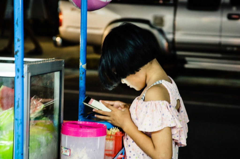 young girl using a smartphone