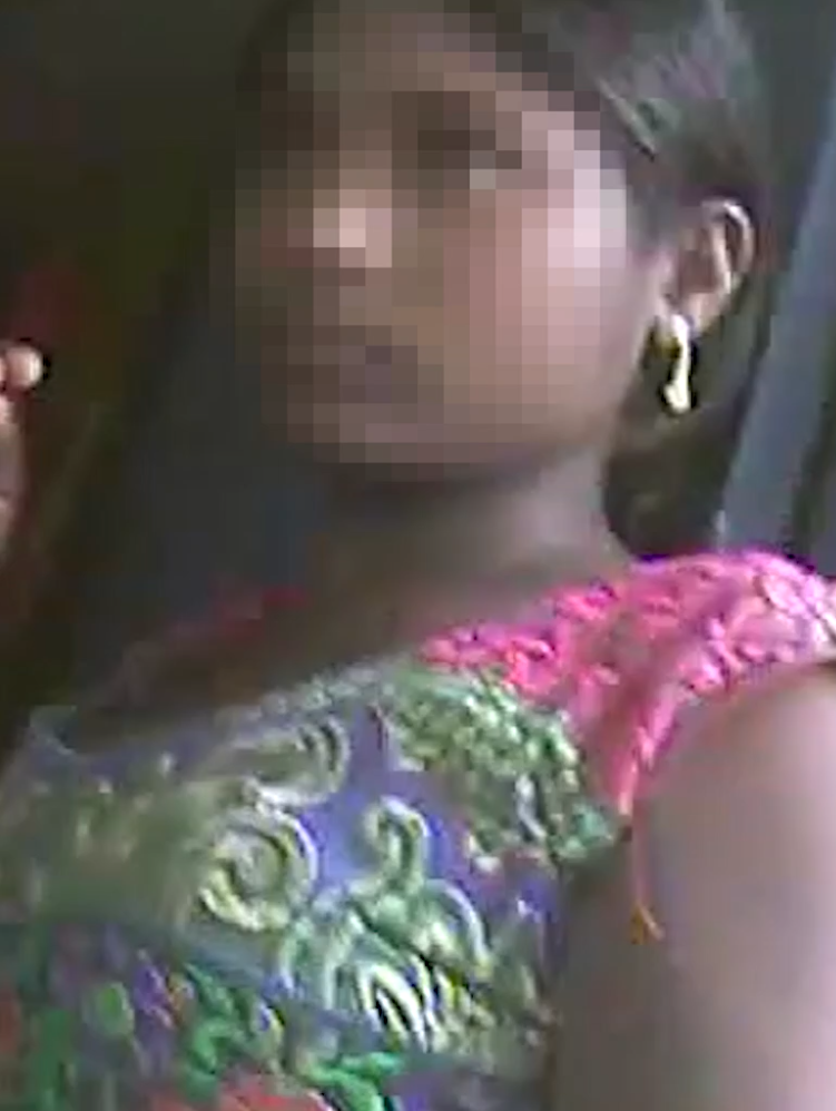A young indian female trafficking victim is captured on covert footage.