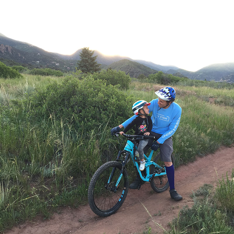 Jimmy Garcia riding a mountain bike with daughter
