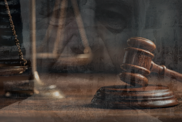 Gavel over Epstein's face