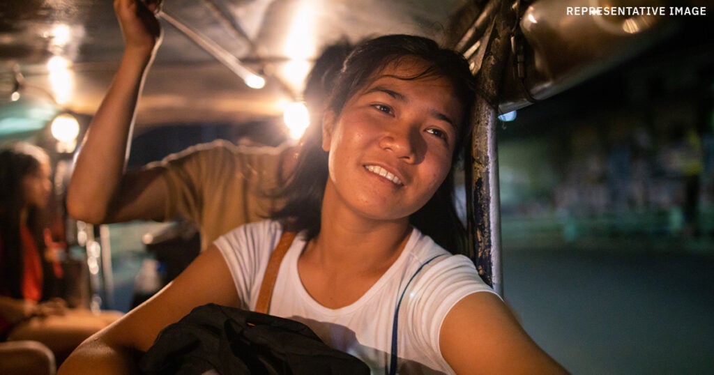 representative survivor from Operation Neon looking relieved riding a jeepney