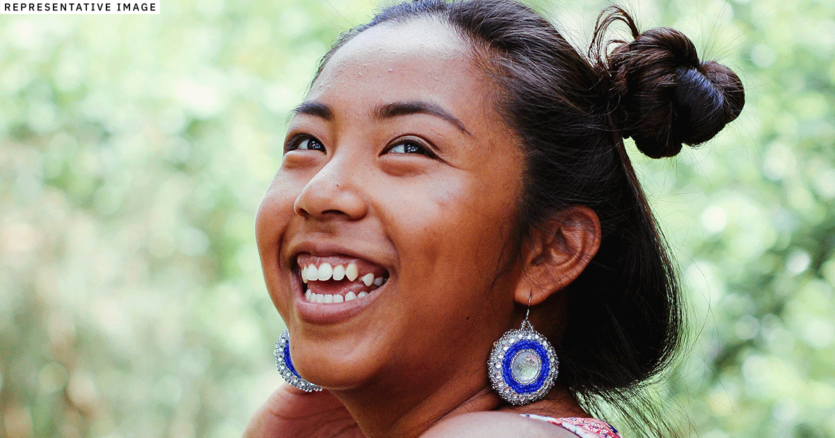 smiling teenage Filipino girl
