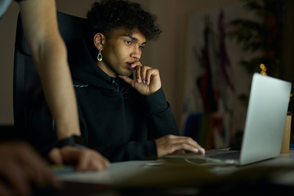 Young man working on a laptop