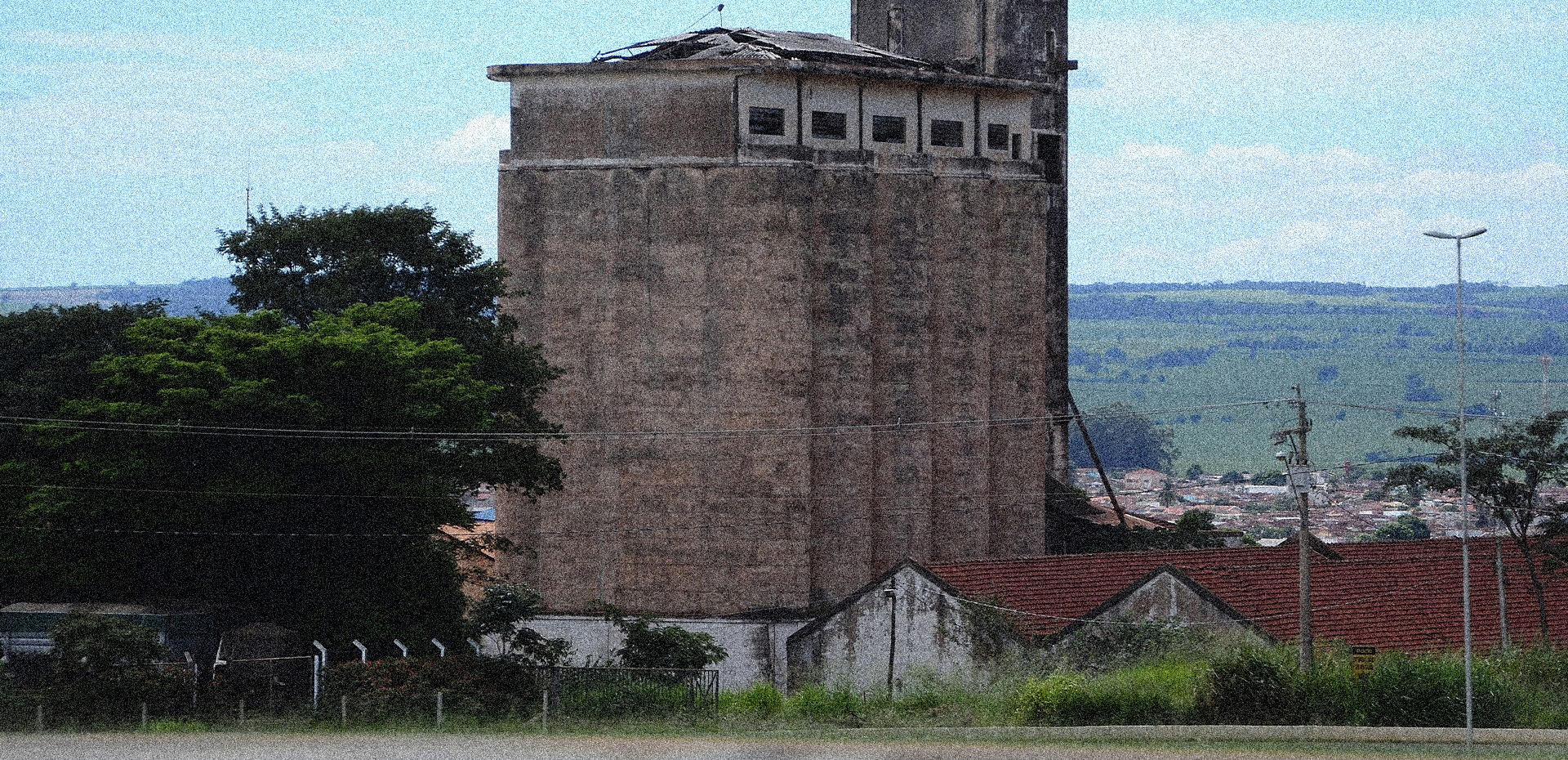 Run down factory in Brazil on a bright day.