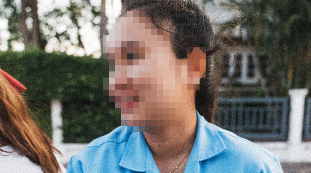 Blurred face image of a young Thai woman who has survived human trafficking