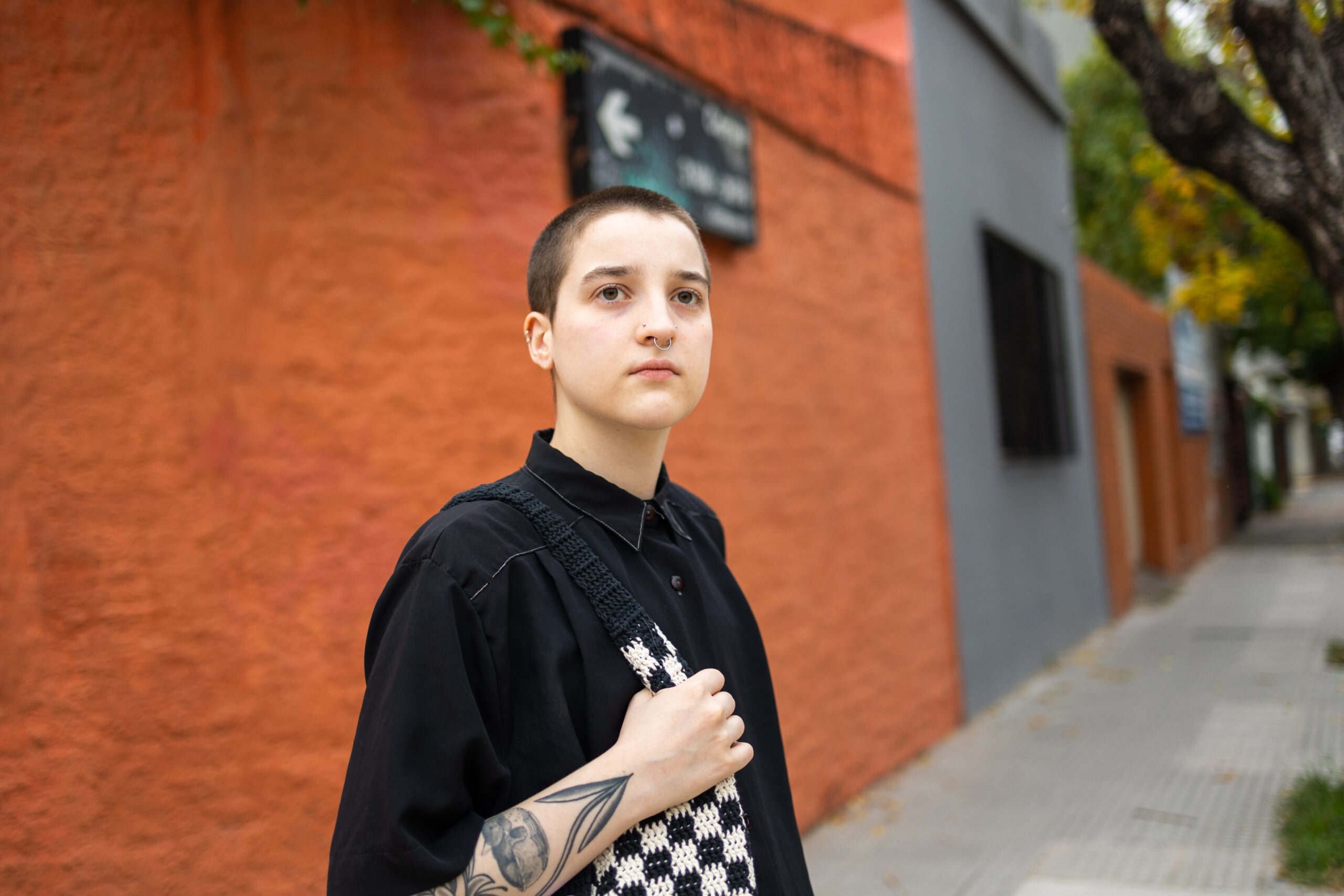 Young gender nonconforming individual in an urban setting