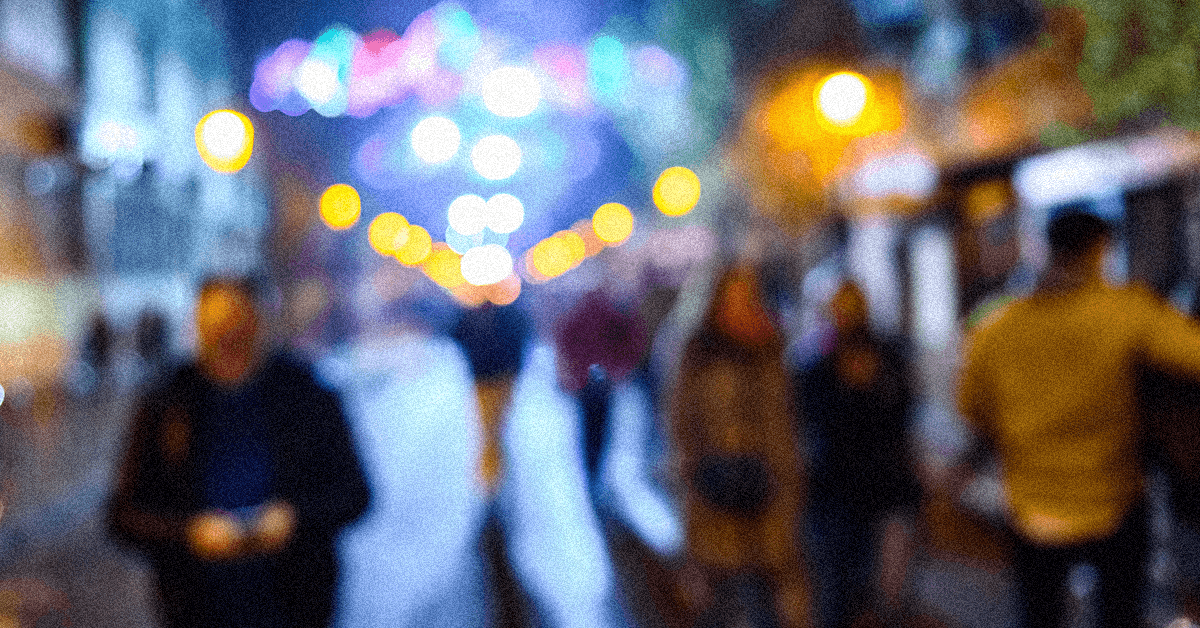 Blurred, busy Latin American street